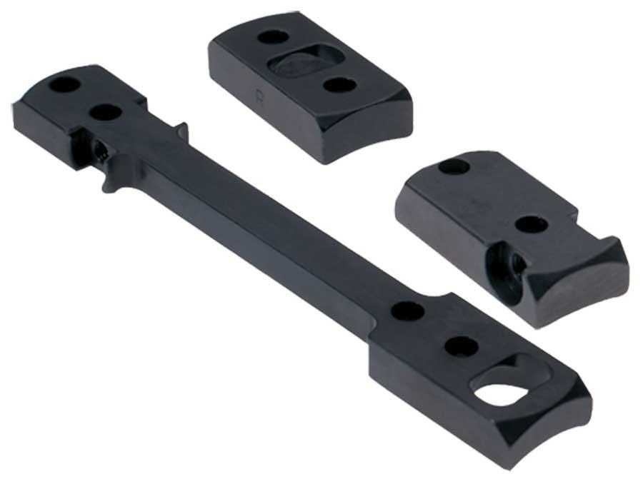 Black firearm mounting base with screws and components