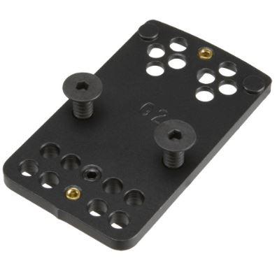 Black mounting plate with screws and holes