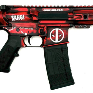 Red and black stylized toy firearm with graphics.