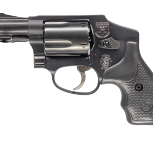 Black revolver on a white background