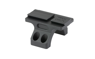 Gray mounting accessory for firearm attachments.