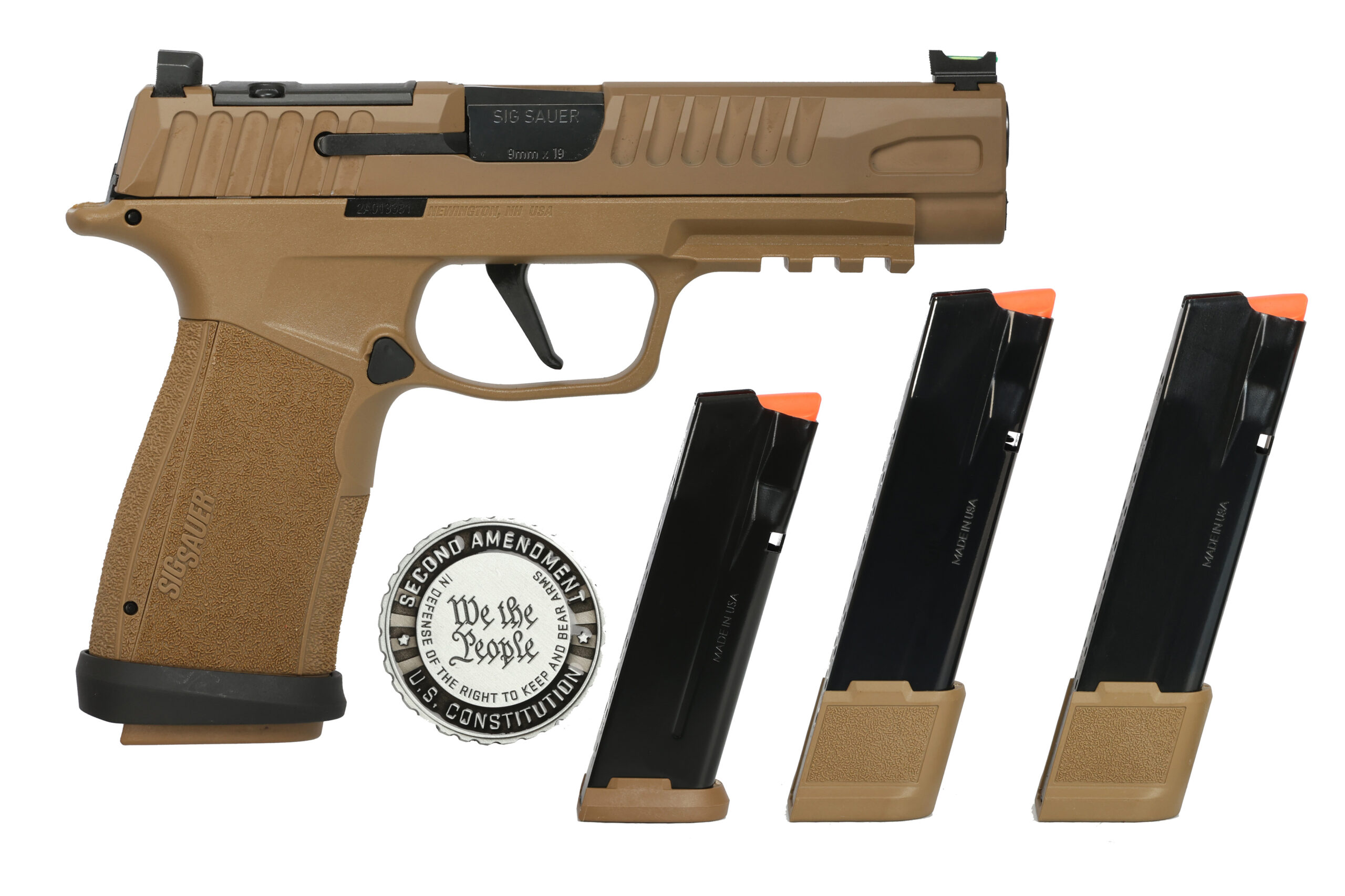 SIG Sauer handgun with three magazines.