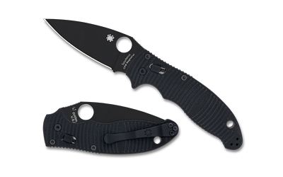 Black folding knife with textured handle.