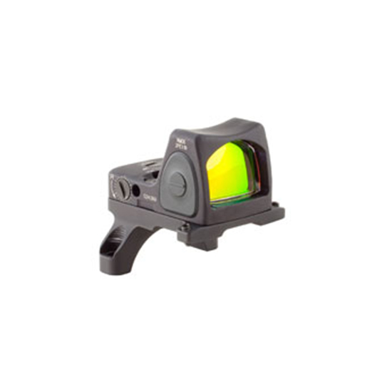 Reflex sight with green lens for firearms.