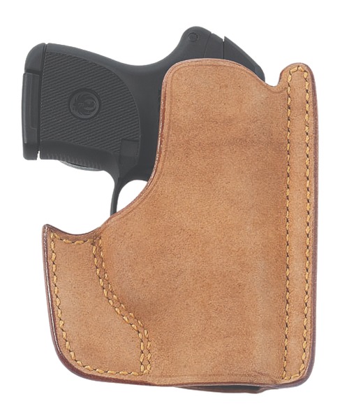 Handgun in leather holster.