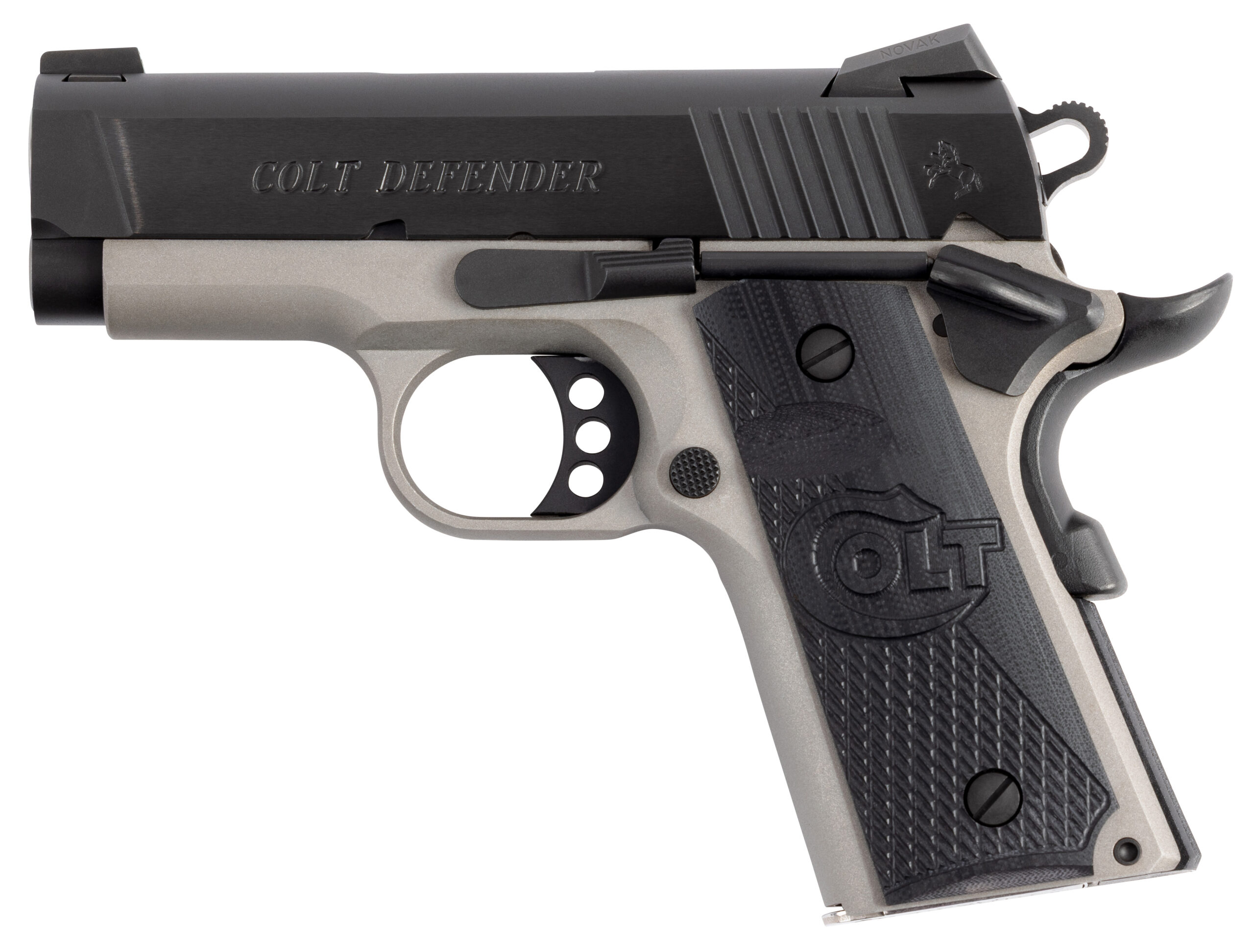 Colt Defender handgun in a side view