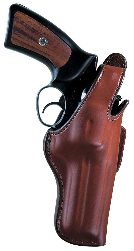 Handgun in leather holster close-up.
