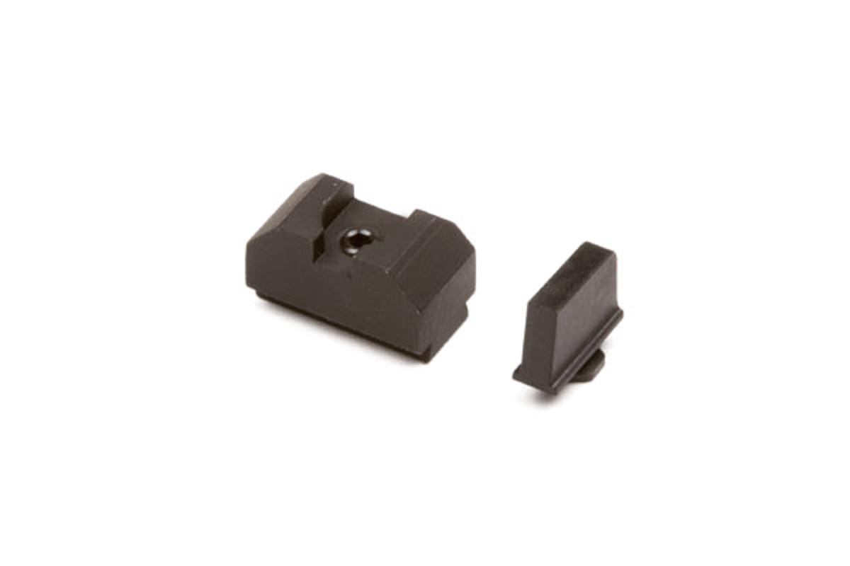Two black firearm sight components
