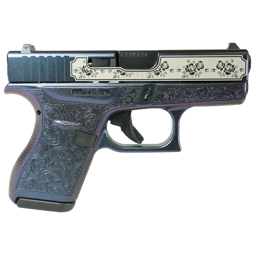 Decorative handgun with intricate floral designs