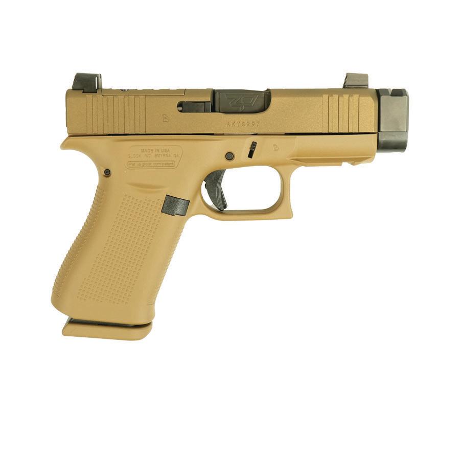 Tan handgun displayed on a white background.