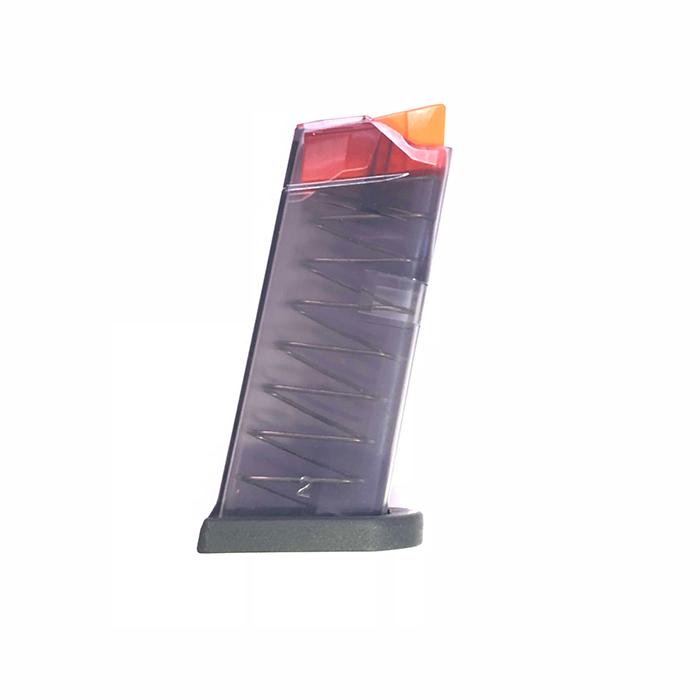 Transparent magazine with orange tip.