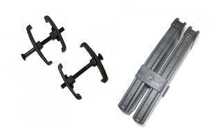 Two black clamps and a folding hinge tool.