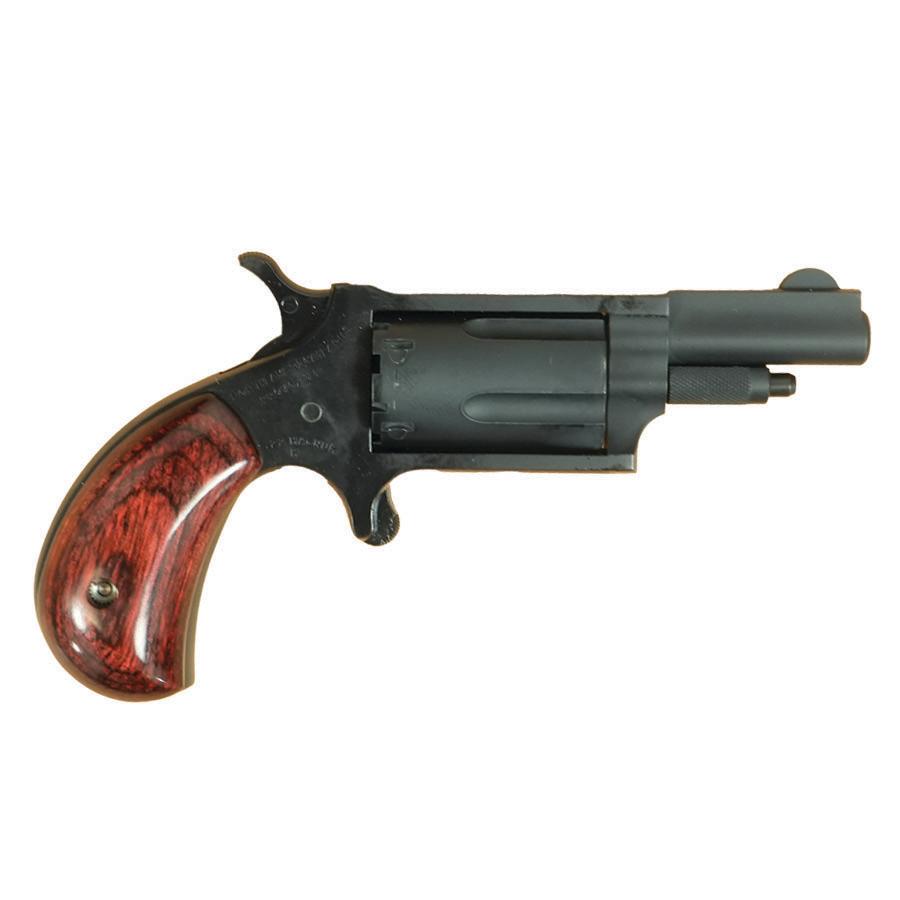 Close-up of a vintage revolver with wooden grip.