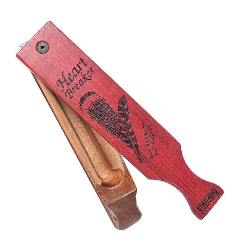 Red wooden paddle called Heart Breaker