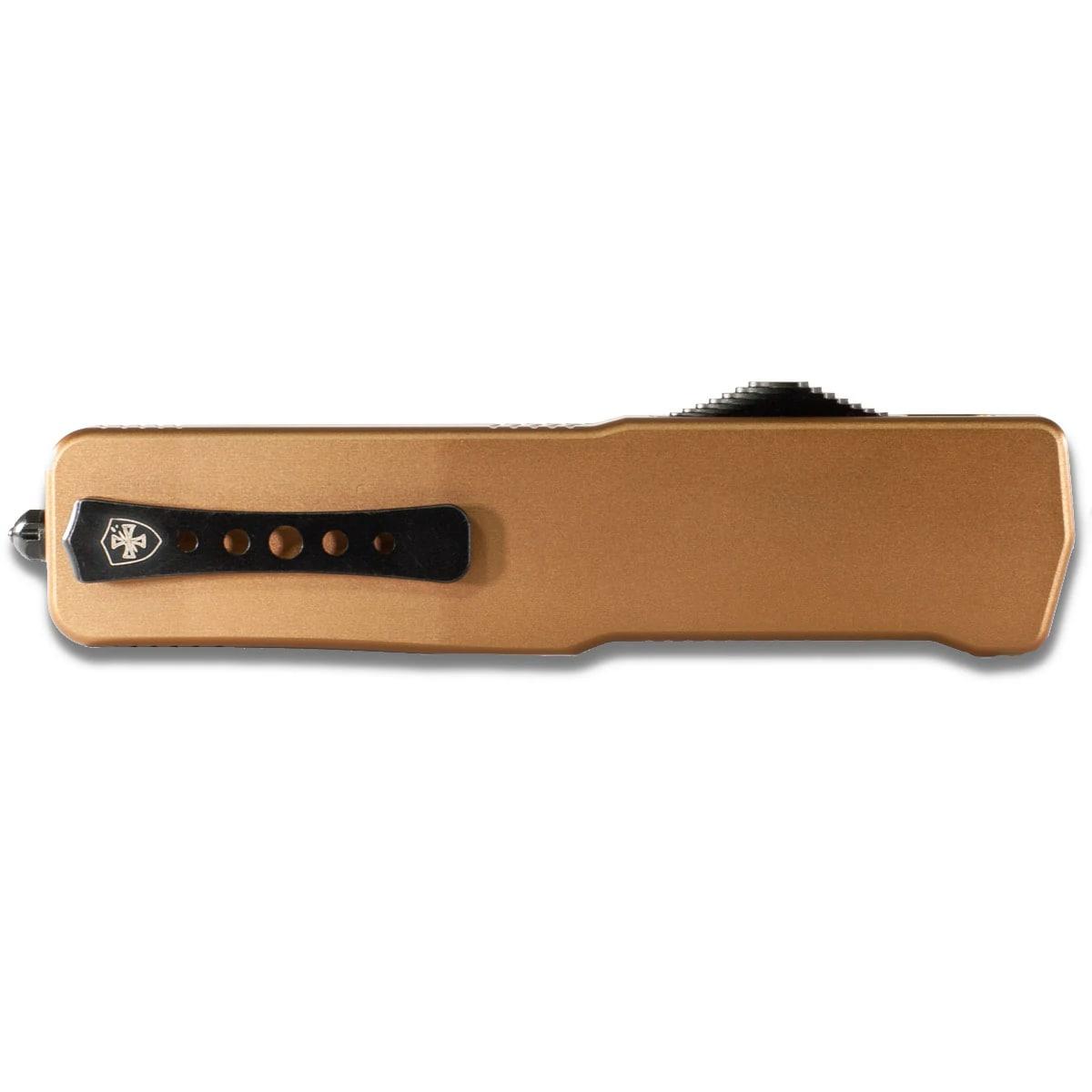 Close-up of a sleek, metallic brown knife