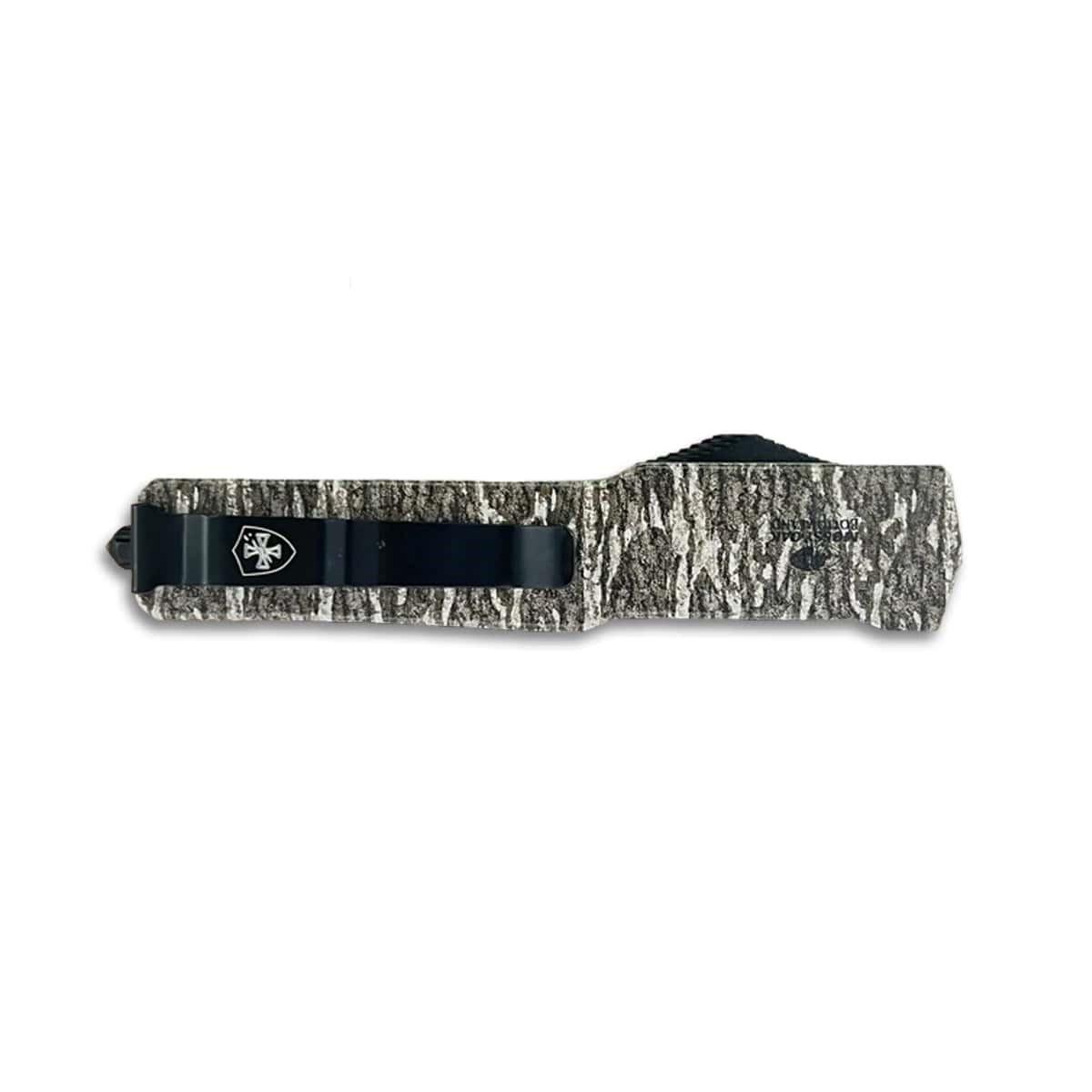 Camo-patterned knife sheath for outdoor use.