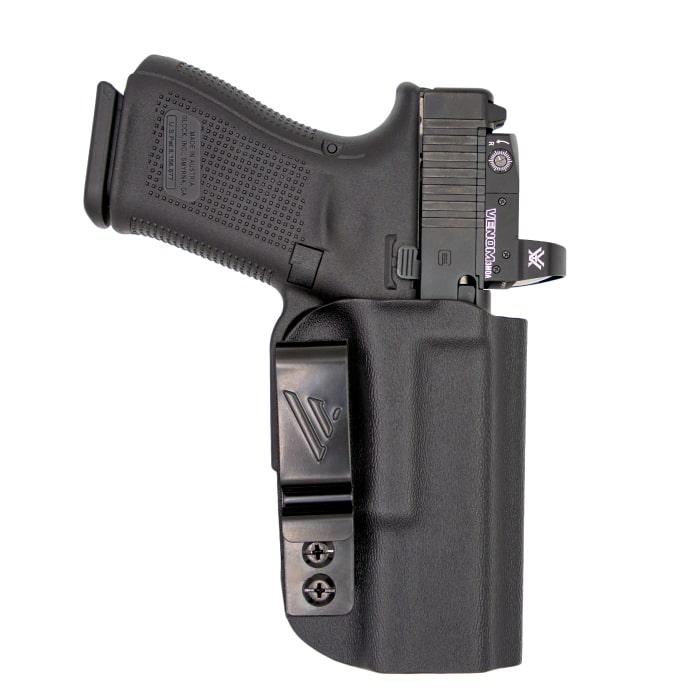 Side view of a handgun in a holster.