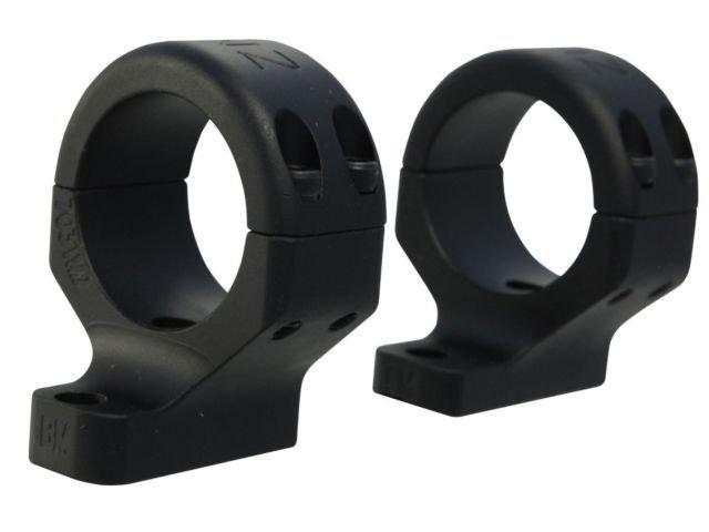 Black scope rings for rifle mounting.