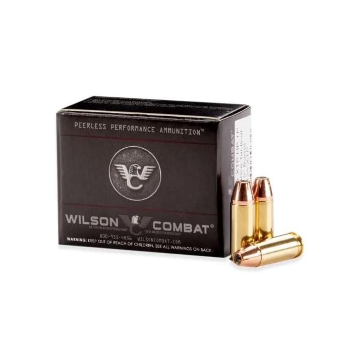 Box of Wilson Combat ammunition with bullets.