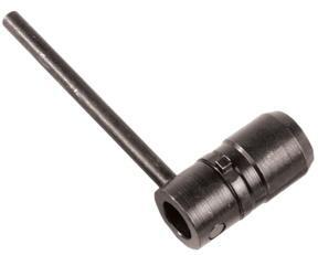 Black tool with a long handle and circular end.