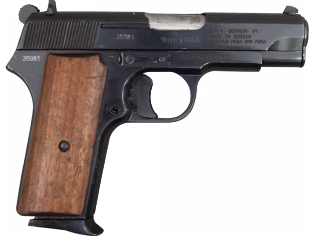 Handgun with wooden grip and metal frame