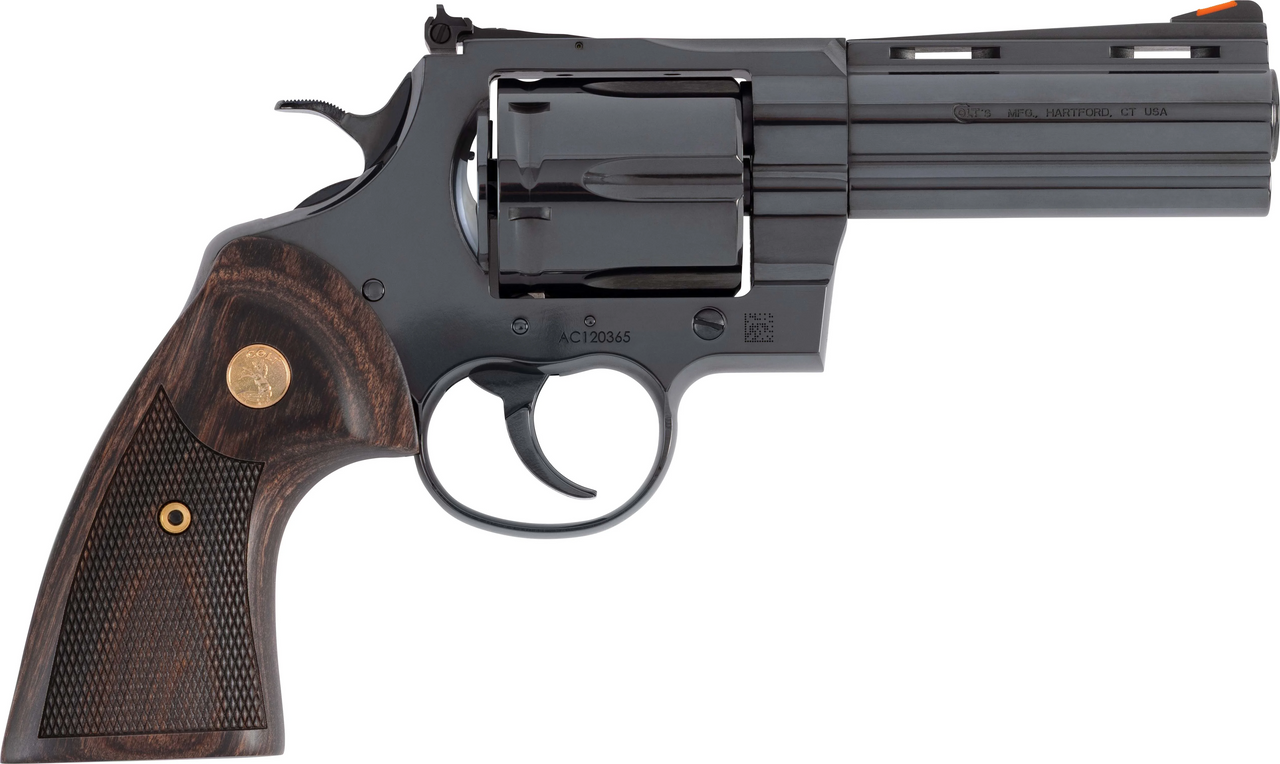 Close-up of a revolver with wooden grip.