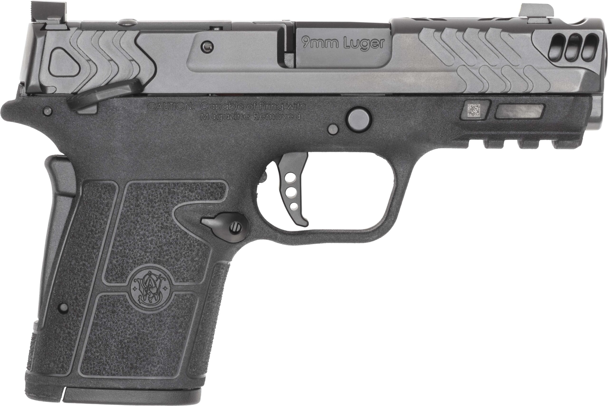 Handgun with textured grip and safety features