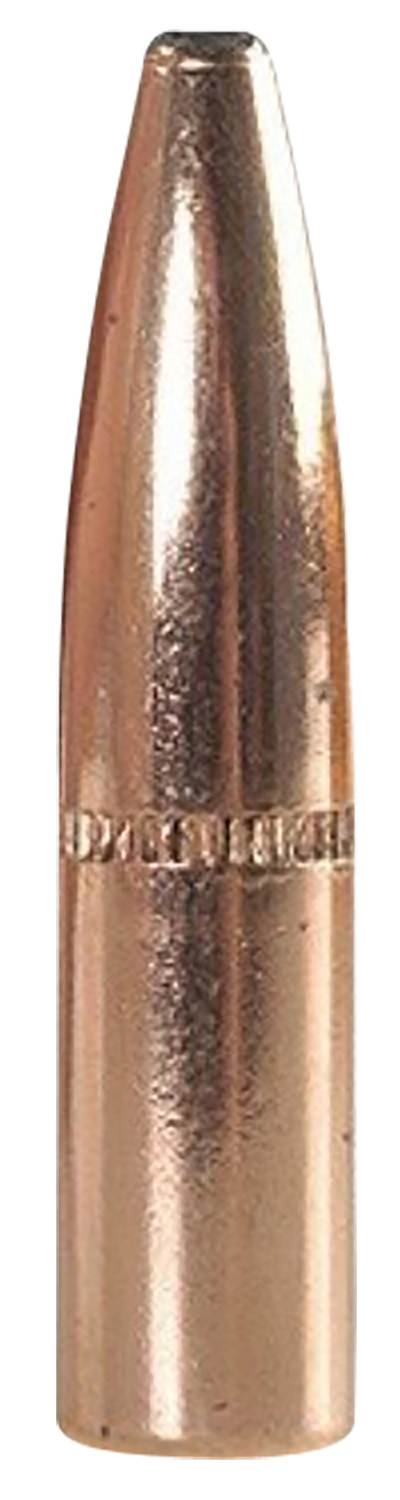 Copper rifle bullet on white background