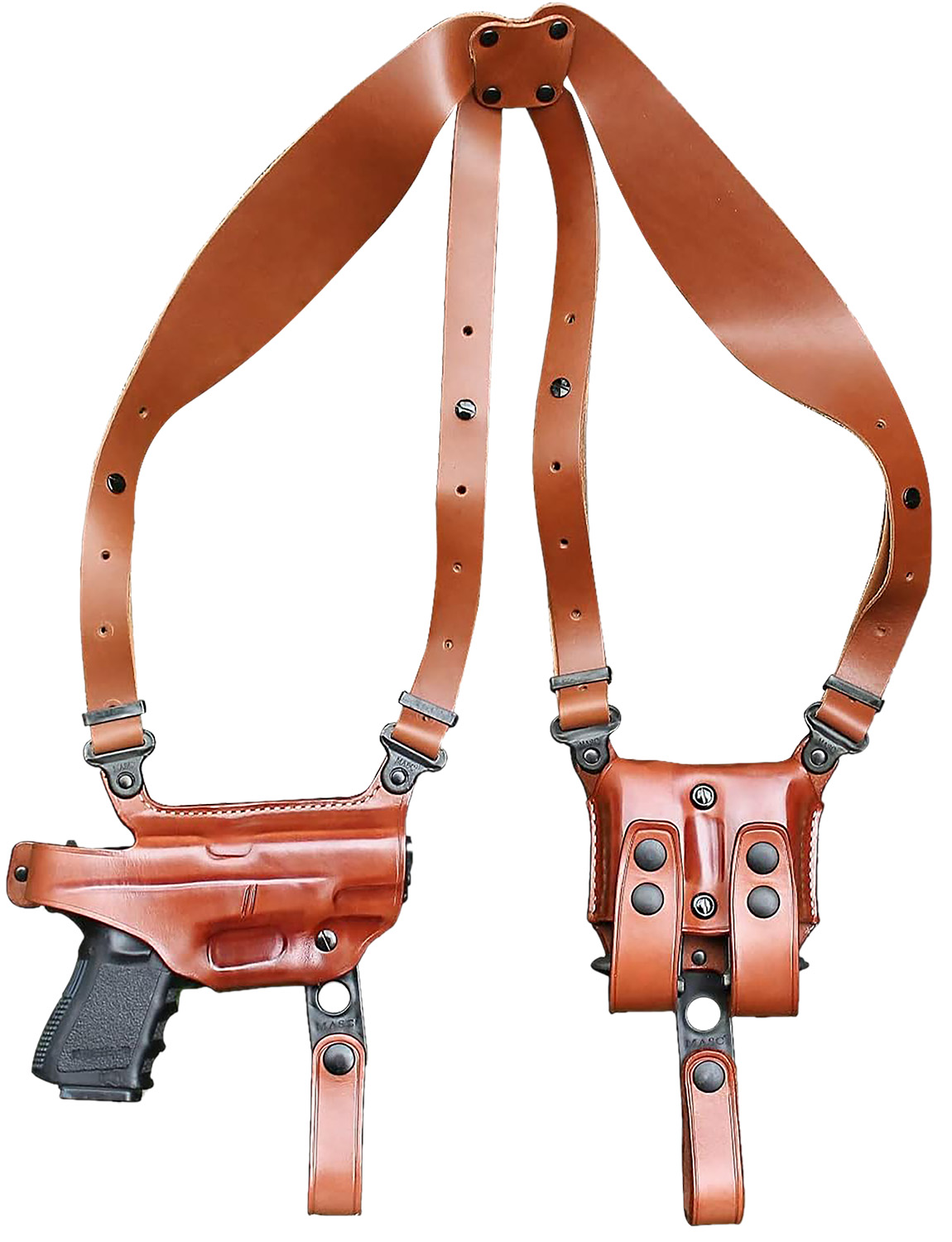Brown leather shoulder holster with handgun
