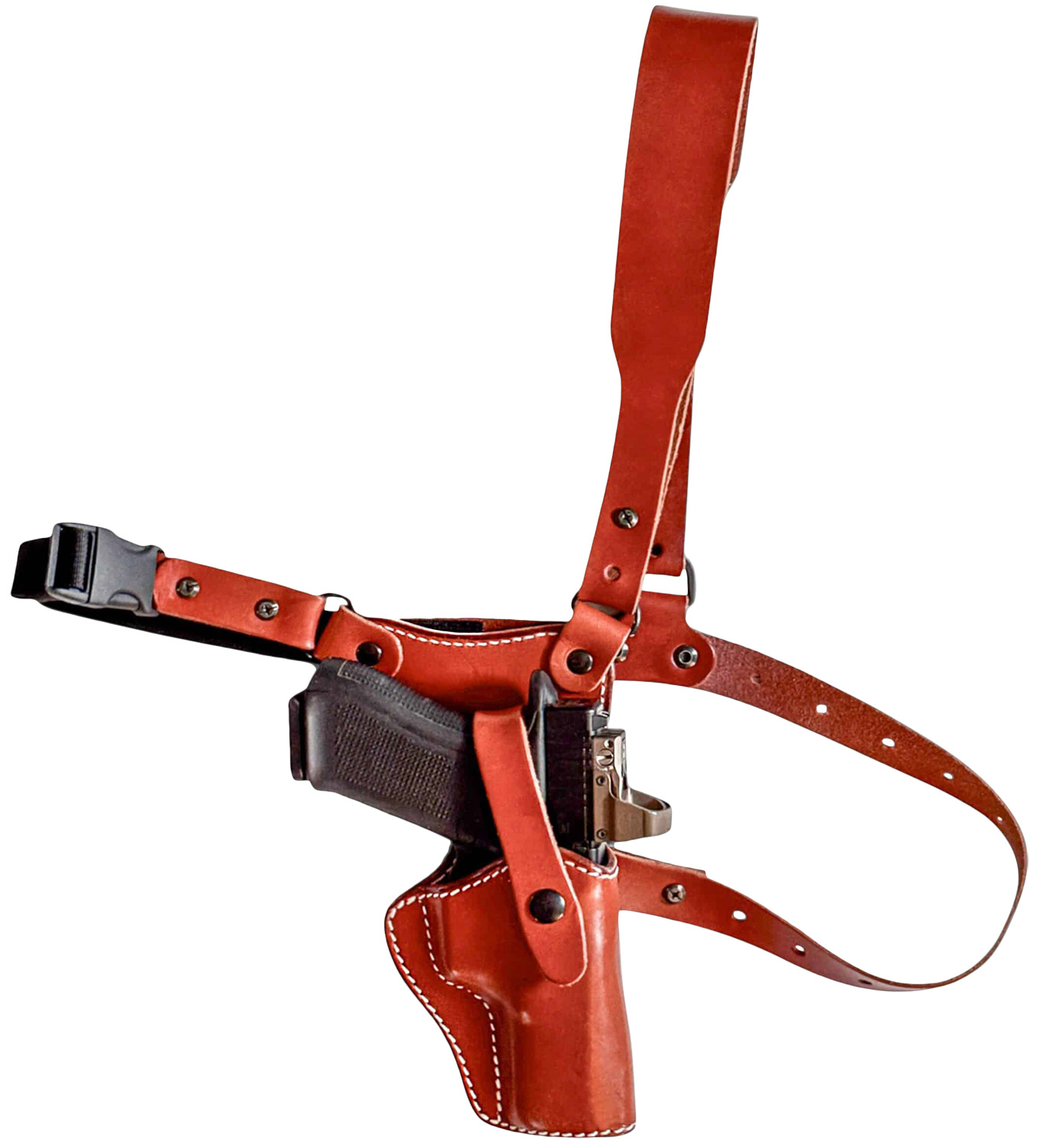 Brown leather shoulder holster with handgun