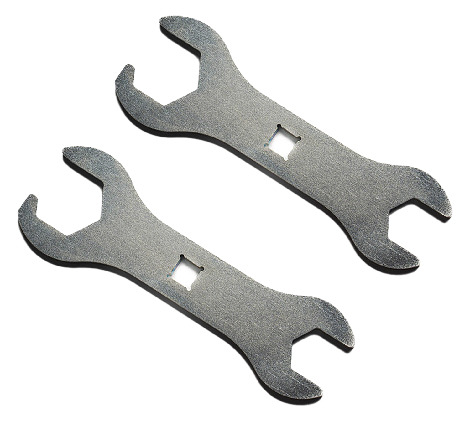 Two flat metal open-end wrenches