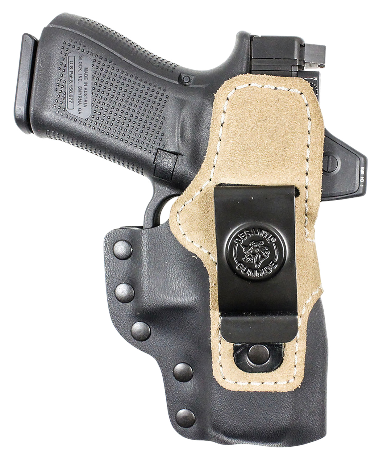 Handgun in leather belt holster with clip