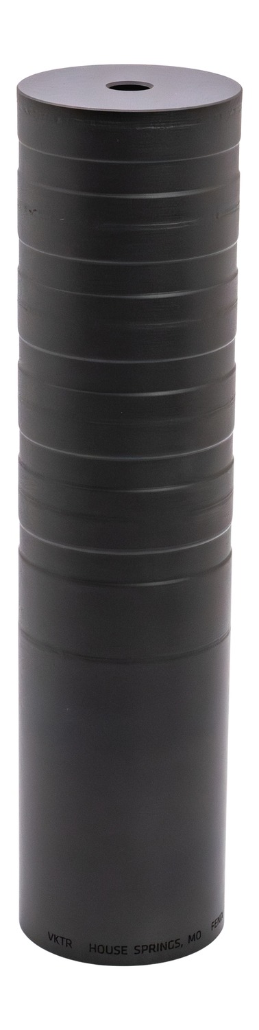 Tall black cylindrical metal device with ridges
