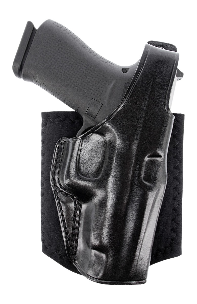 Handgun in black leather holster