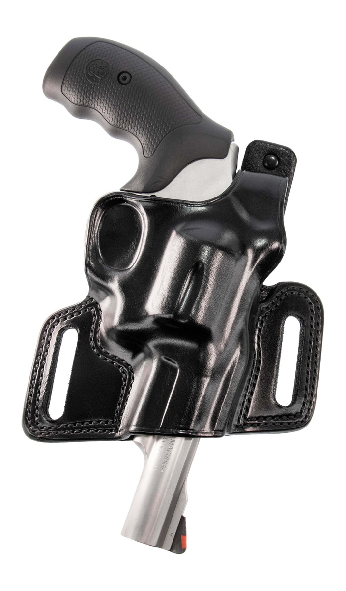 Revolver in black leather belt holster