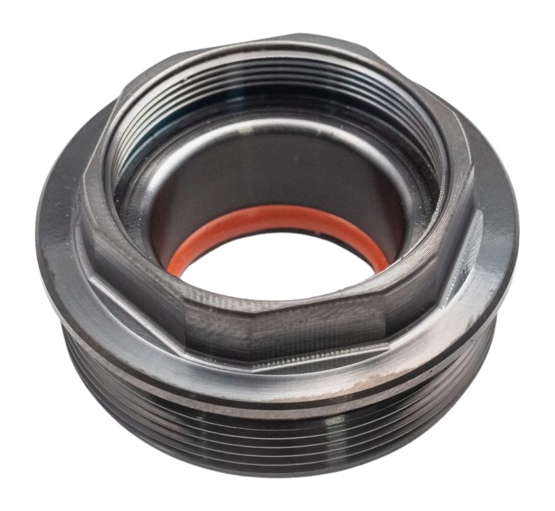 Close-up of a threaded metal connector component.