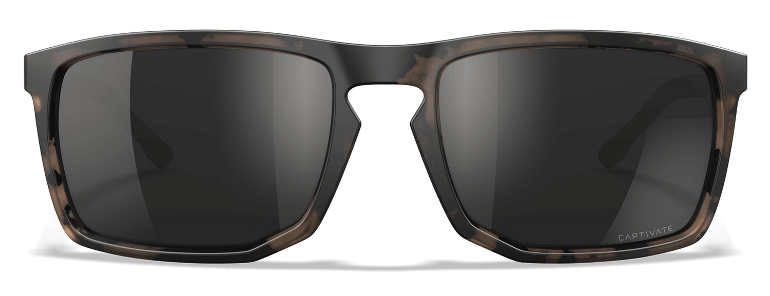 Stylish brown tortoise sunglasses with dark lenses.
