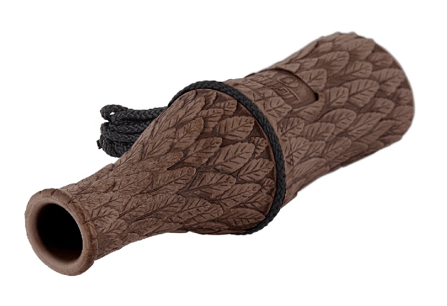 Carved wooden duck call with leaf pattern