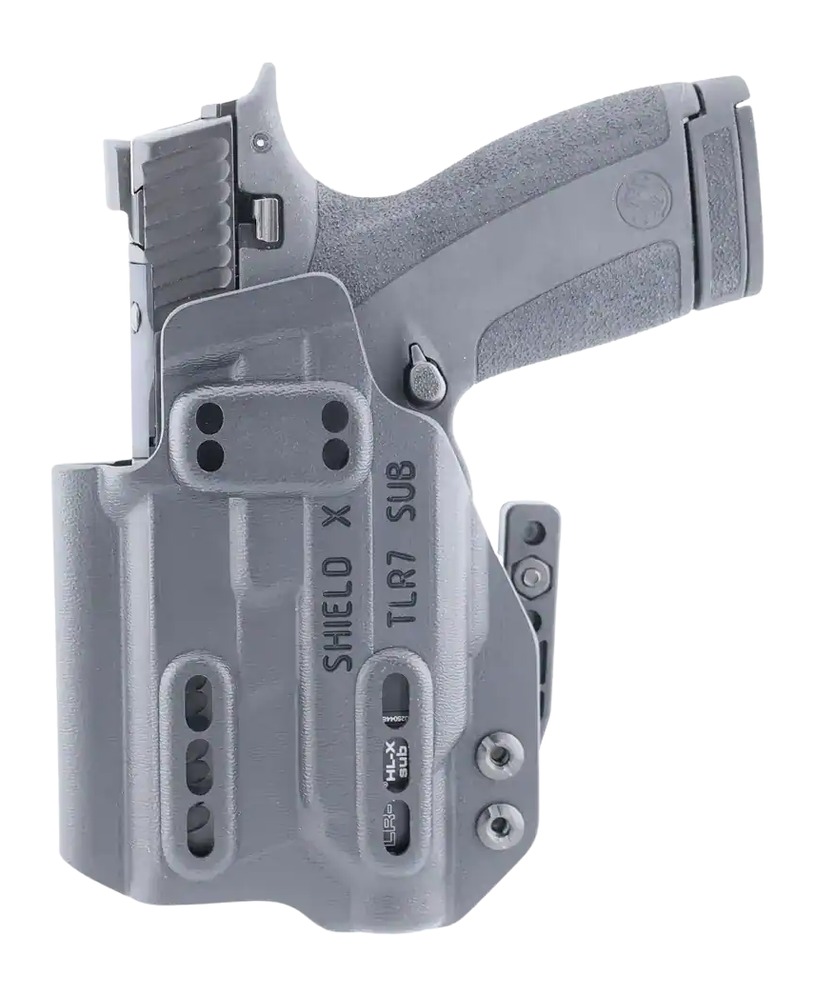 Handgun in gray tactical holster