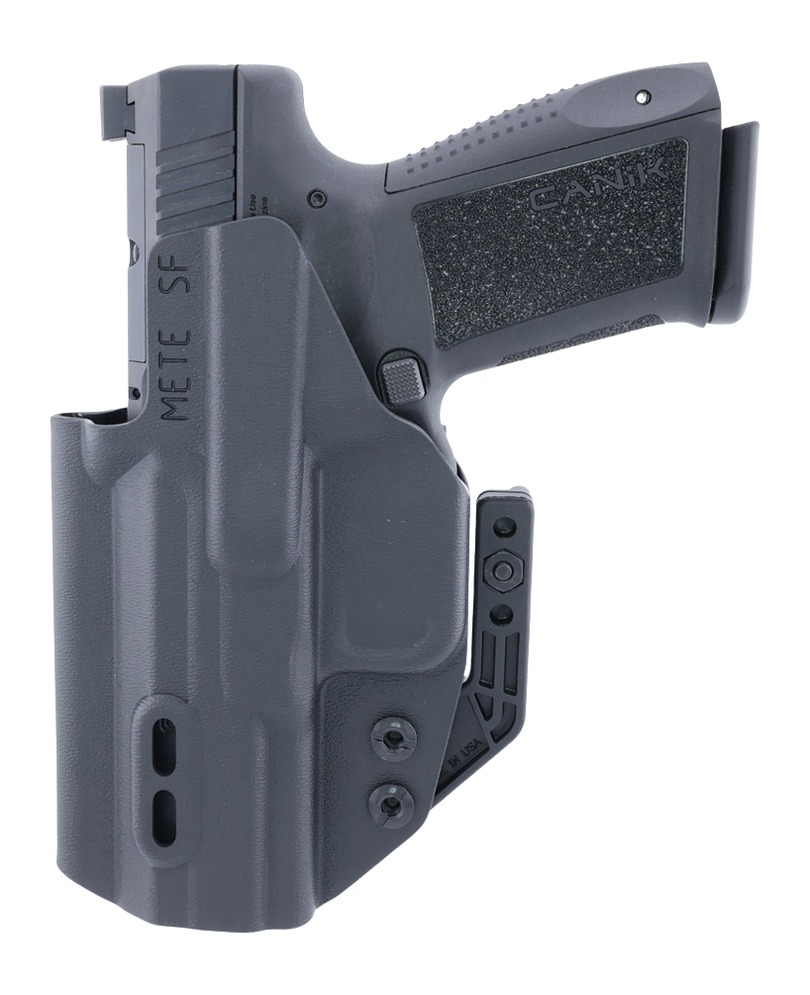 Handgun in gray holster on white background