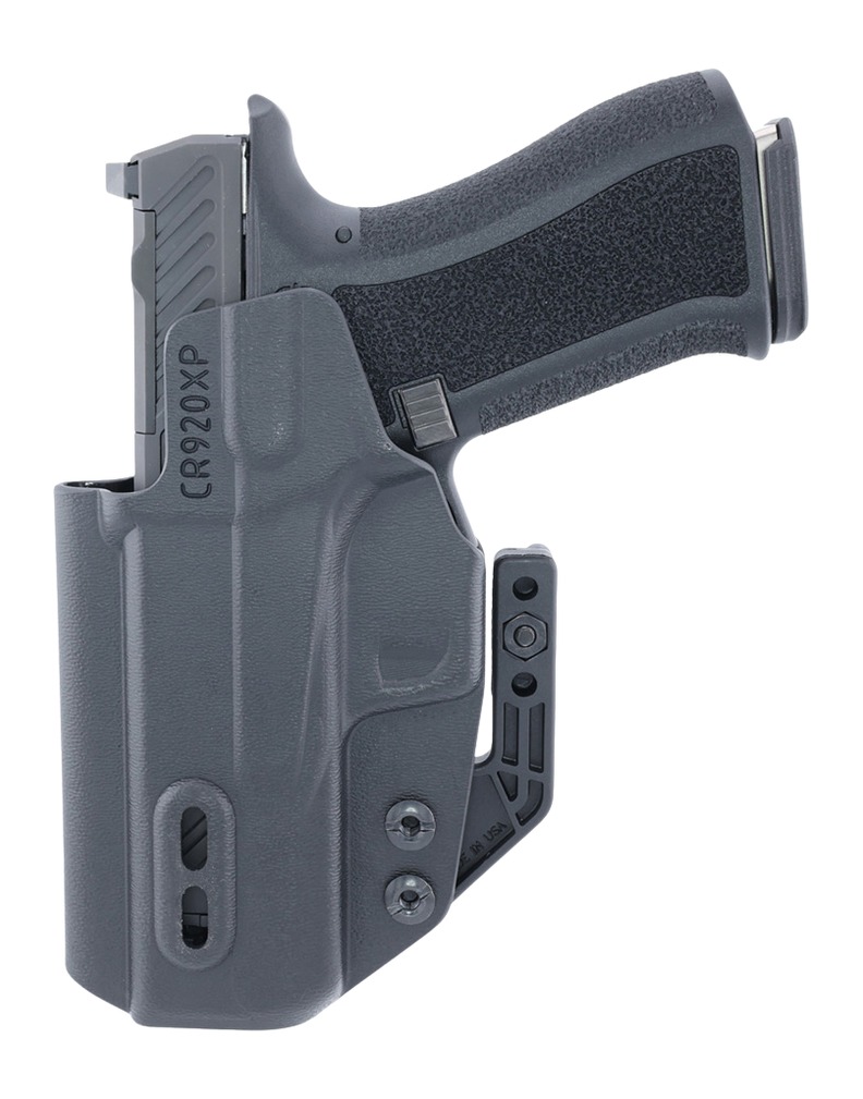 Semi-automatic pistol in gray holster with clip