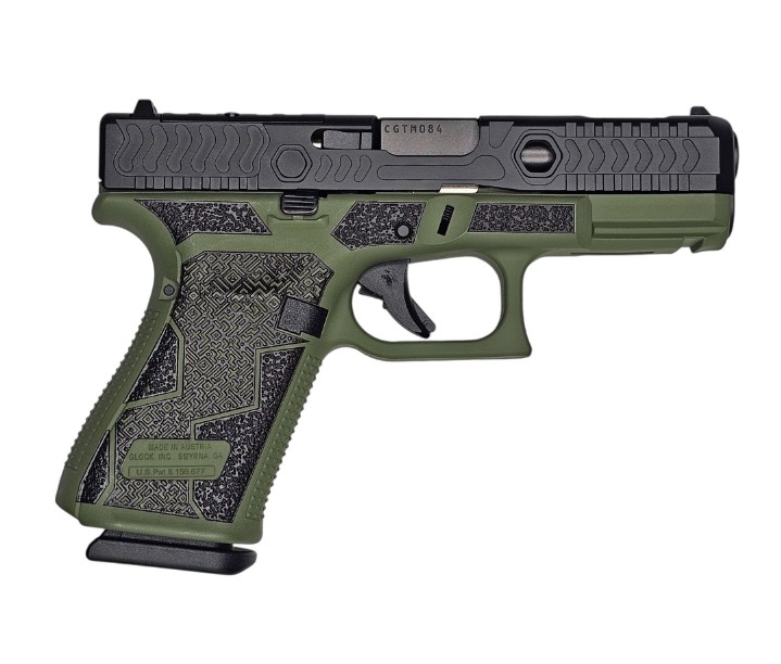 Green and black semi-automatic handgun on white background