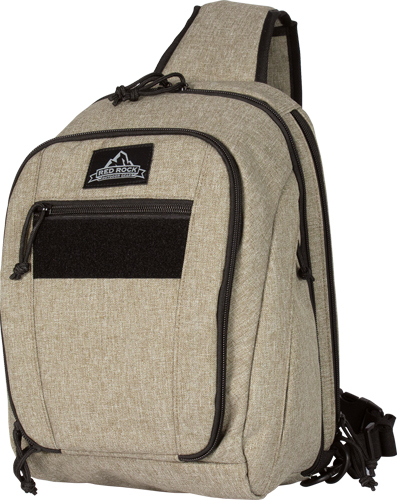 Beige sling backpack with black zippers and logo