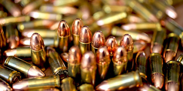 Close-up of assorted bullets stacked together