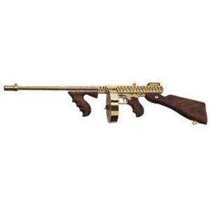 Gold-colored vintage firearm with wooden grip