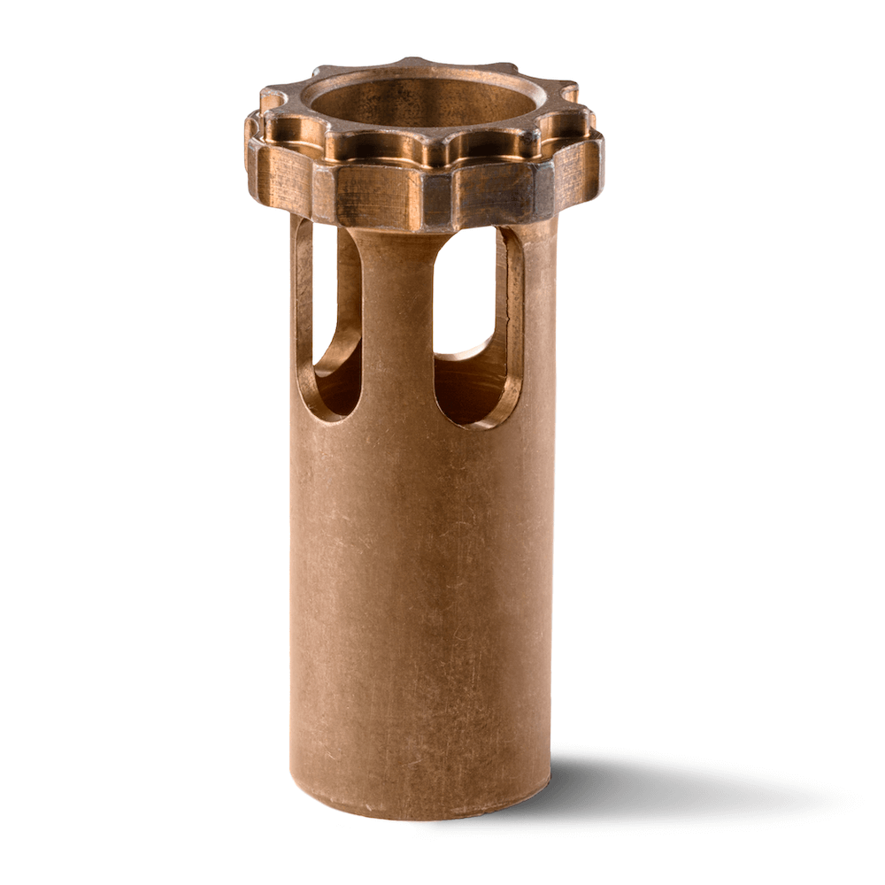 Bronze cylindrical metal component with slotted sides