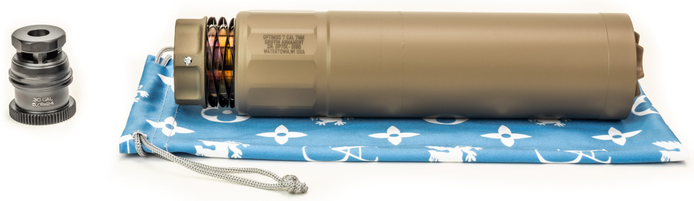 Tan firearm suppressor with visible ammunition rounds