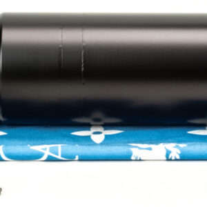 Black firearm suppressor on blue patterned pouch