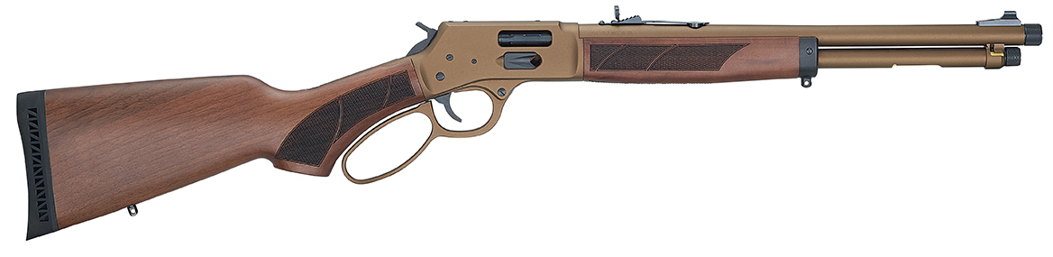 Lever-action rifle with wooden stock and brass finish