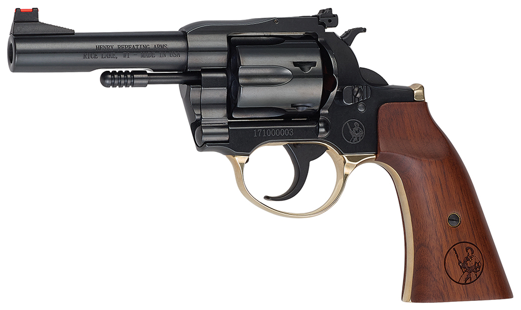 Black revolver with wooden grip on white background